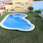 With A Serene Ocean And Mountain View